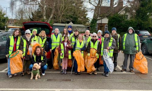 Great British Spring Clean 2025 A large group of volunteers equipped with litter picking sticks and bags for the Great British Spring Clean.