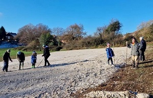 Volunteers sowing seed at the butterfly bank in Spring Fields, Warners End