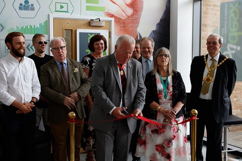 Sir Mike Penning MP cutting the ribbon Sir Mike Penning MP cutting the ribbon