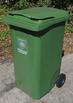 Green wheeled bin A green wheeled bin showing the Dacorum Borough Council logo
