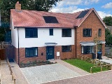 Exterior of a house with driveway in Barton Close, Wilstone, Tring