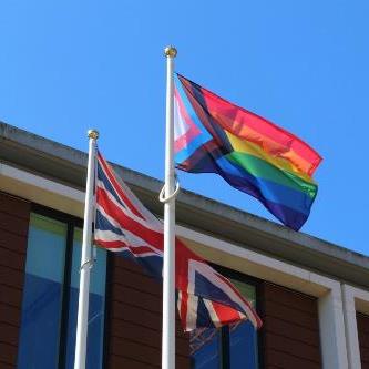 Pride and Union flag flying outside the Forum